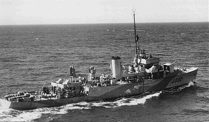 a canadian algerine class minesweeper with depth charges, a canadian algerine class minesweeper with depth charges,