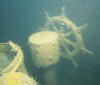 again, a similar brass compass binnacle with two oil lamps next to the wheel from a baltic sea wreck