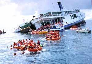 the king cruiser settling in the water after the order to "abandon ship" was given. no one was injured during the evacuation. the king cruiser settling in the water after the order to "abandon ship" was given. no one was injured during the evacuation.